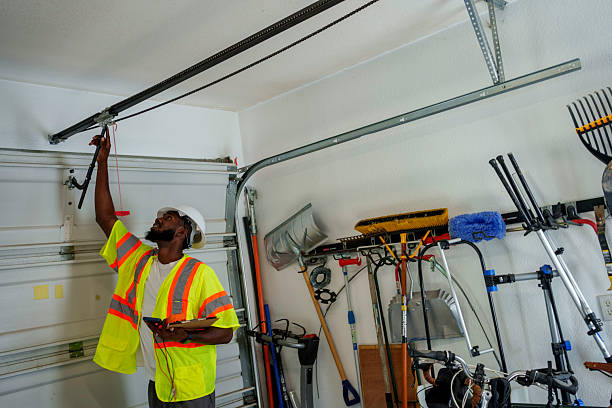 Professional Garage Door Panel Replacement technician working in Iona, ID
